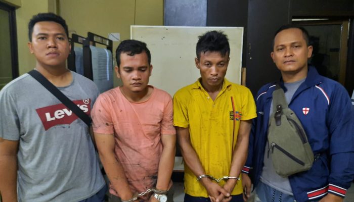 Duduk Dibawah Pohon Sawit, 2 Pria Dibekuk Polisi